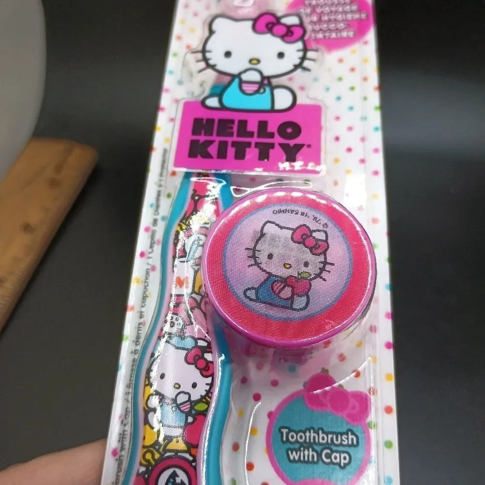 HELLO Kitty standing toothbrush with travel cap head cover included